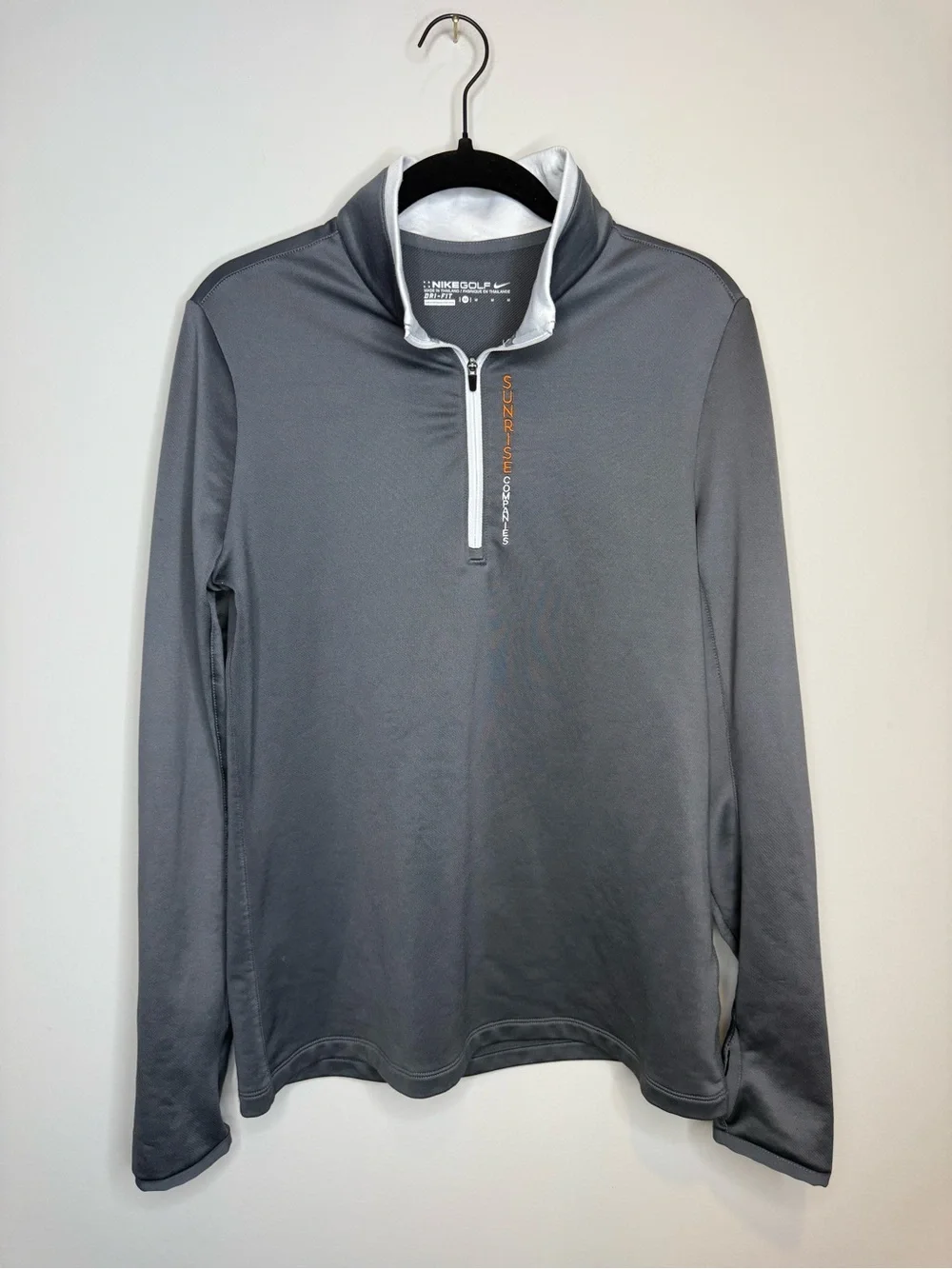 Nike Golf Dri-FIT 1/4 zip pullover featuring the 